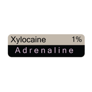 Xylocaine 1% Adrenaline - 40 x 12, PAPER, Black print on Grey Label with Black on violet reverse print, 800 per roll